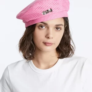 woman with pink cap